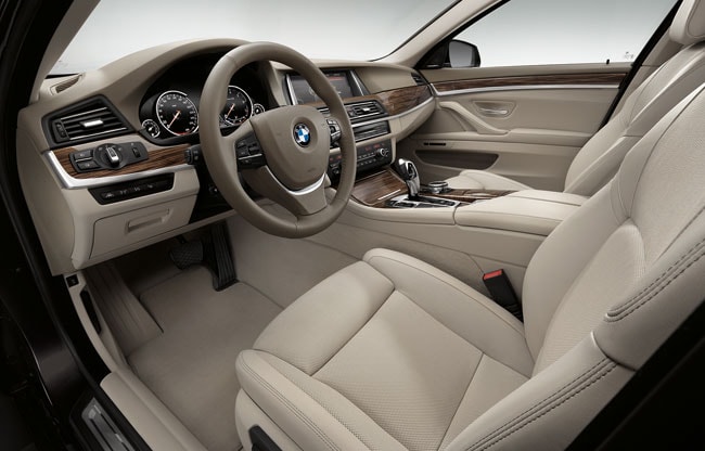 Luxury car interior with tan leather seats