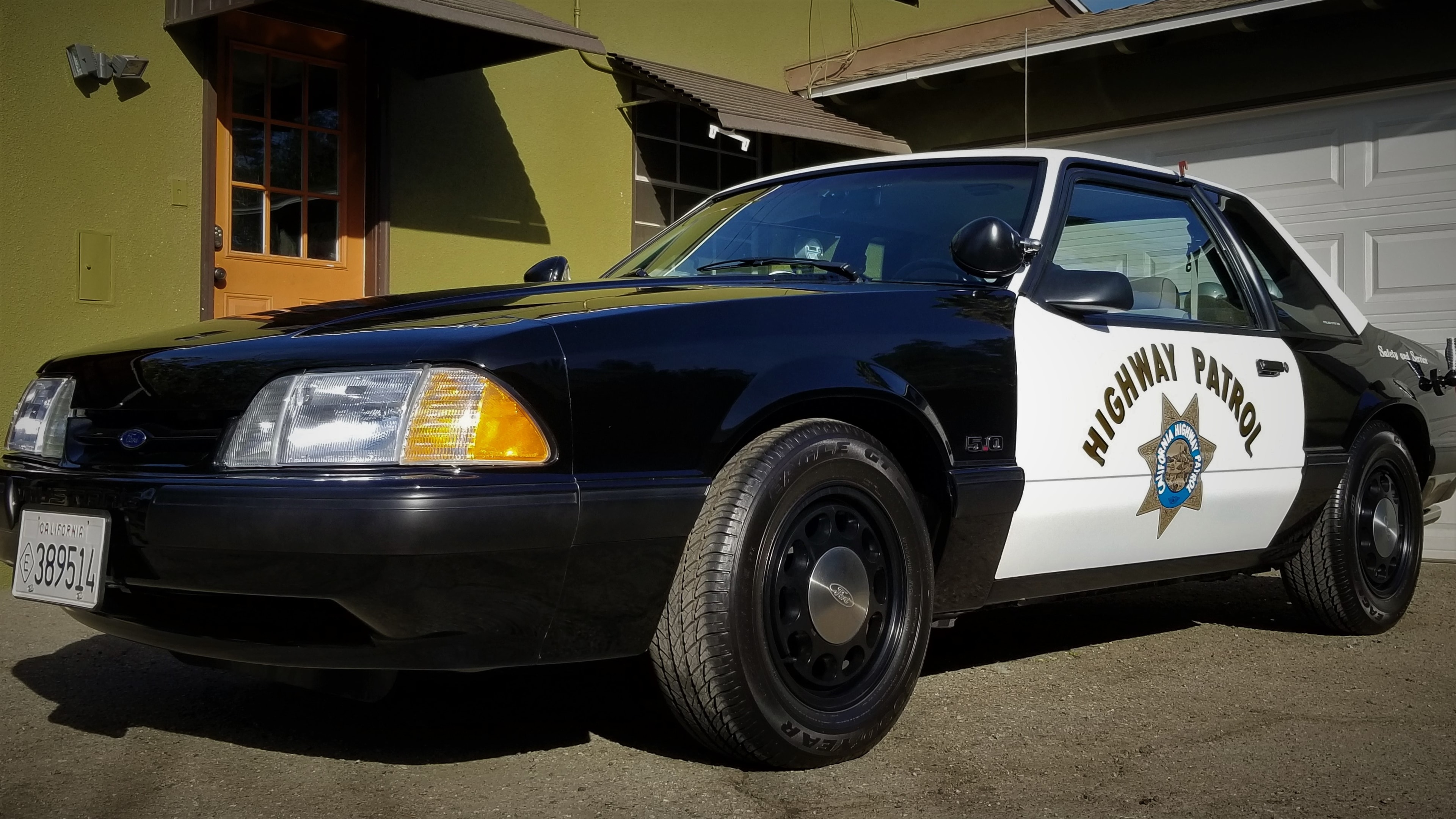 Highway Patrol police cars and muscle cars