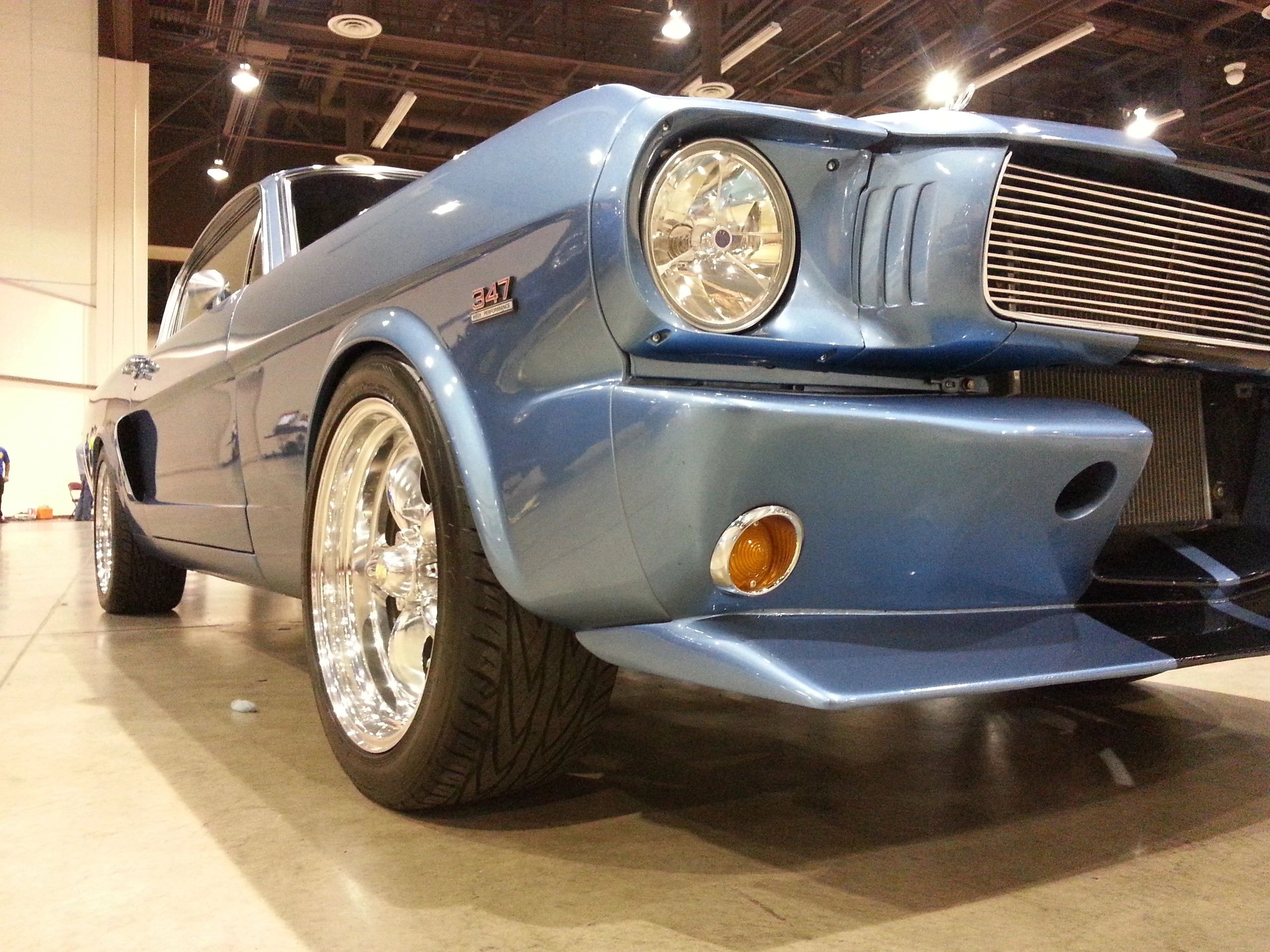 Blue vintage muscle car in showroom